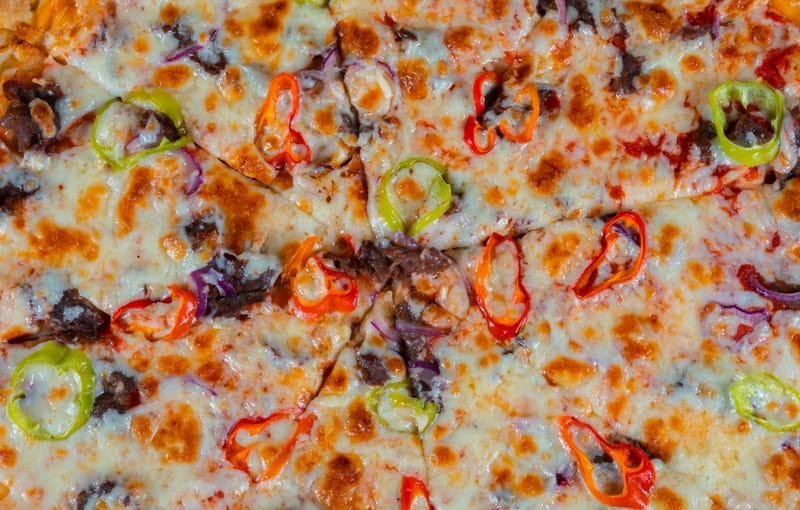 Buffalo ranch pizza with blue cheese and hot sauce